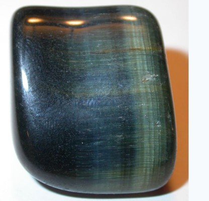 Hawk's Eye Stone with distinct blue and grey striations, symbolizing clarity and insight.